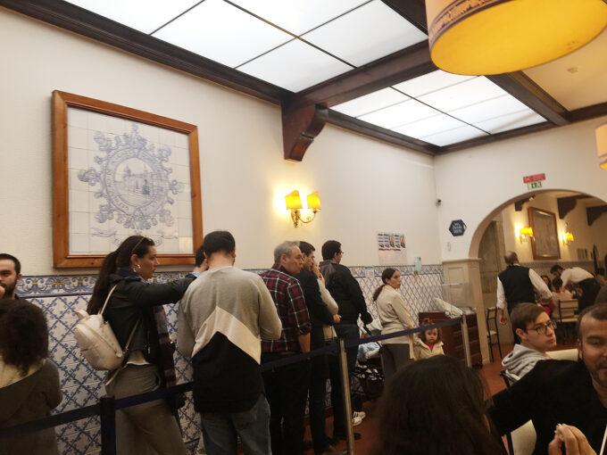 Waiting to be seated at Pasteis de Belem - don't fret, it will only take 5-10 minutes to get seated! The workers are very experienced, and speaks multiple languages so you'll be seated in no time!