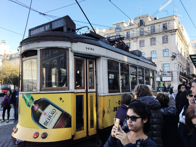 Waiting for Tram 15 at Praça da Figueira to go to Belem. This tram isn't the one (it's #12) but it's the same stop that Tram 15 would stop at